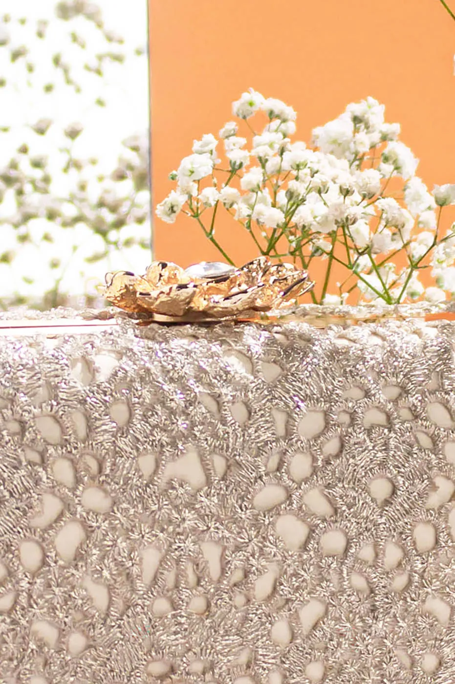 Ivory Cutwork Capsule Clutch